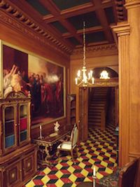 Giac DellAccio had created this wonderful wood lined and carved room. The C18 coving has been stained to look like wood
